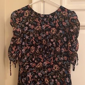 CeCe black floral dress with rouched sleeves and tiered skirt